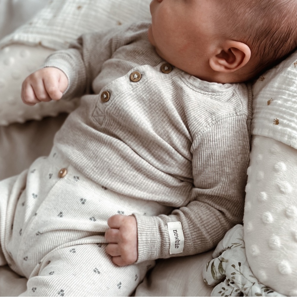 NEWBIE henley style long sleeved bodysuit